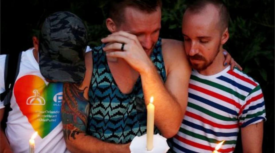 Group mourn victims of Orlando Pulse nightclub shooting (20/06/16). Photo: Reuters