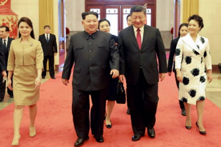 キムは中国の旅の非核化への約束を約束する