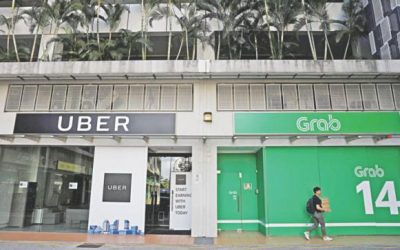 シンガポールのウォッチドッグの罰金はグラブ、Uberは950万ドルの合併