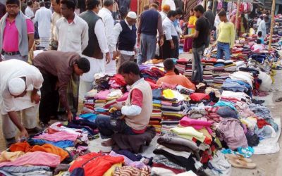 暖かい服の販売はRangpur、Jhenidah地区でペースを上げます