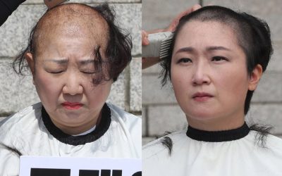 南朝鮮の政治家は首相の退去を要求する首を剃る