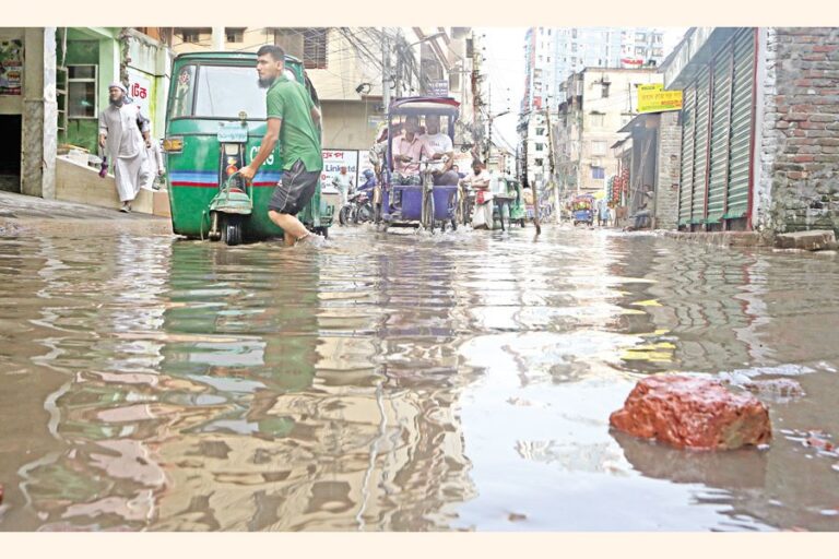 首都の交通量の多いムグダパラ・マンダ道路は長い間水浸しになっている